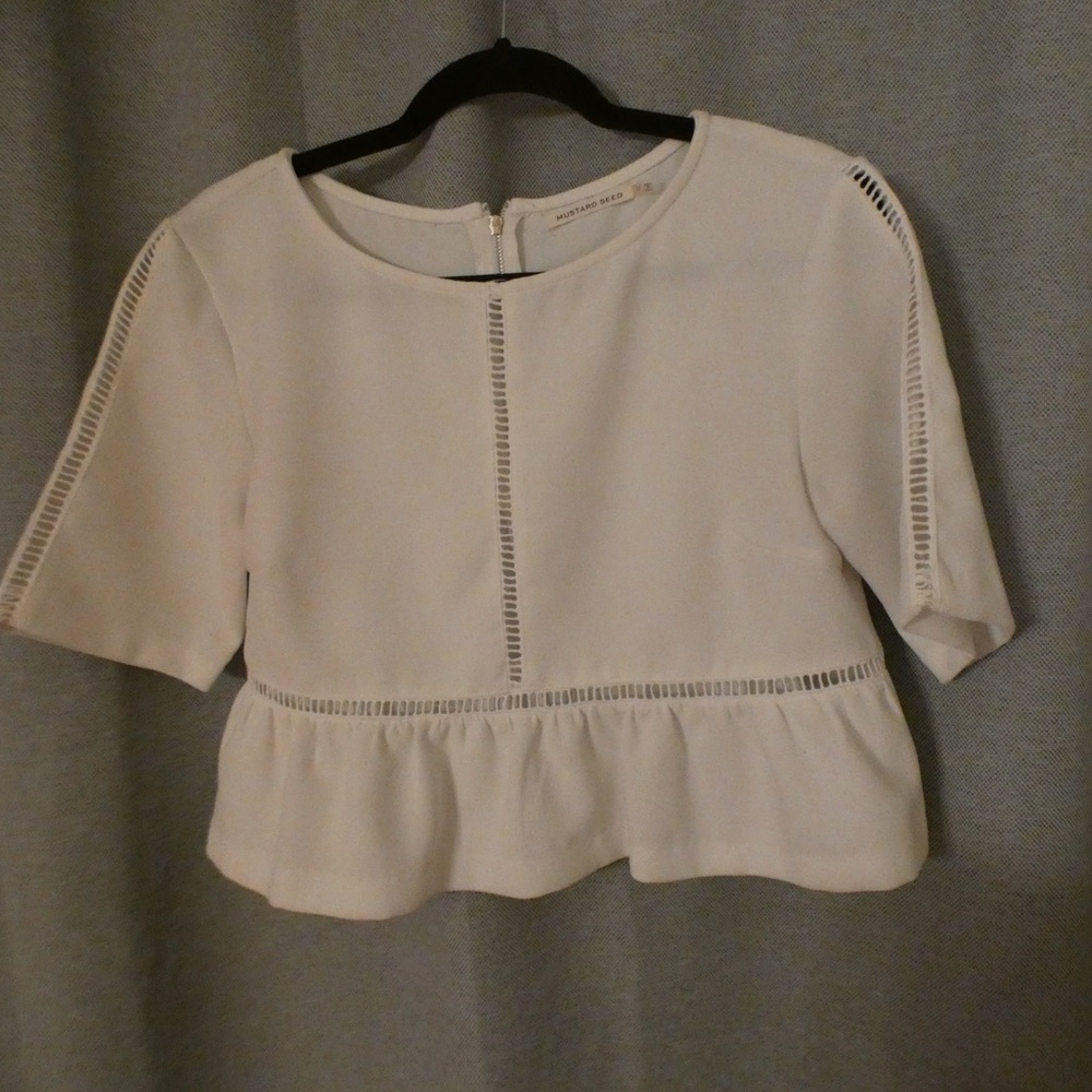 Cropped white peplum top! Detailed sleeve and mid